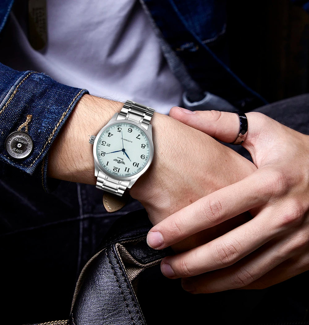 Klassiek herenhorloge – Retrostijl met datumweergave en blauwe wijzers, automatisch mechanisch uurwerk, prestigieus merk, stalen kast en leren band